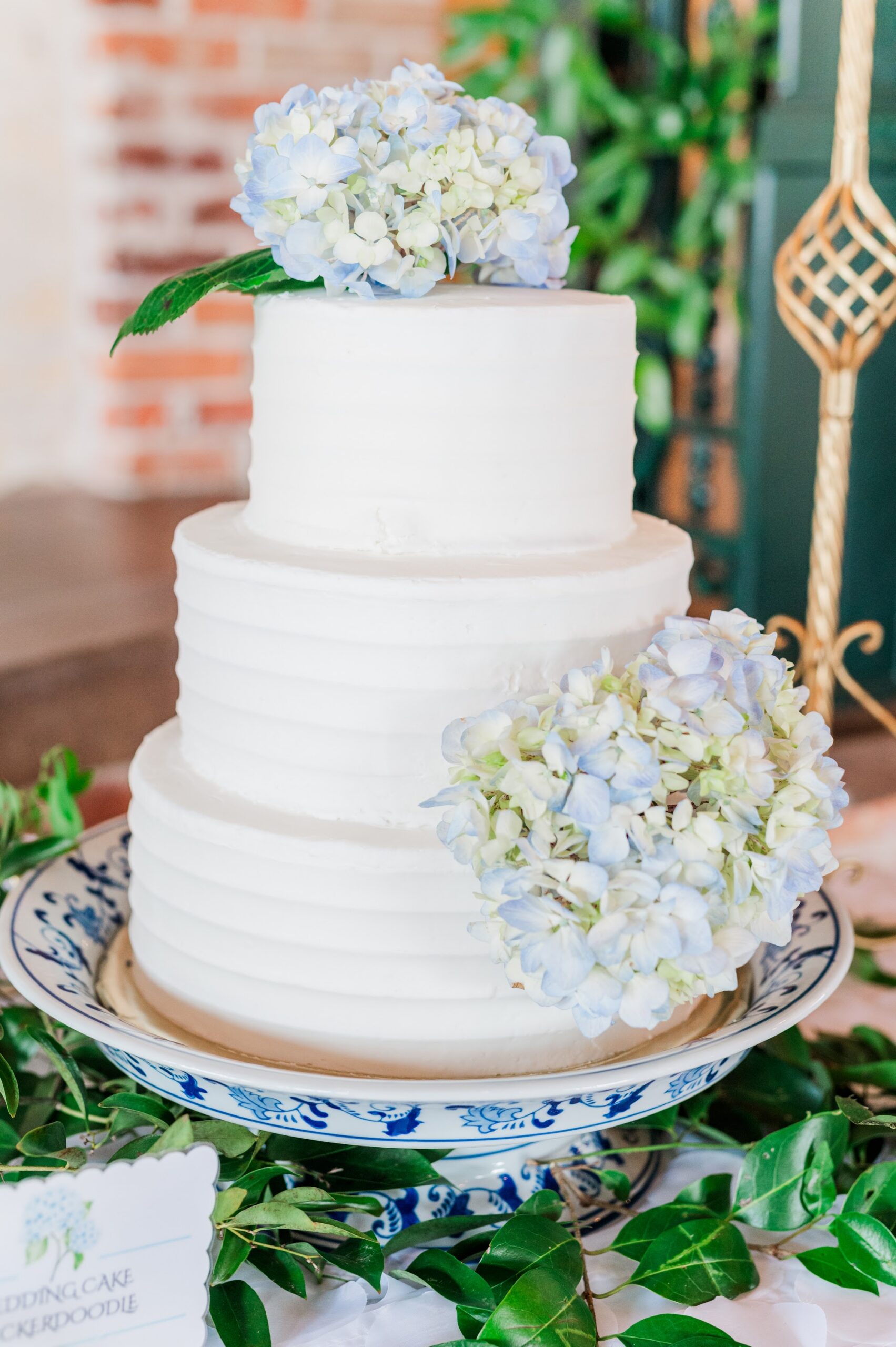 Wedding cake with floral details at The Bleckley Inn, Anderson SC