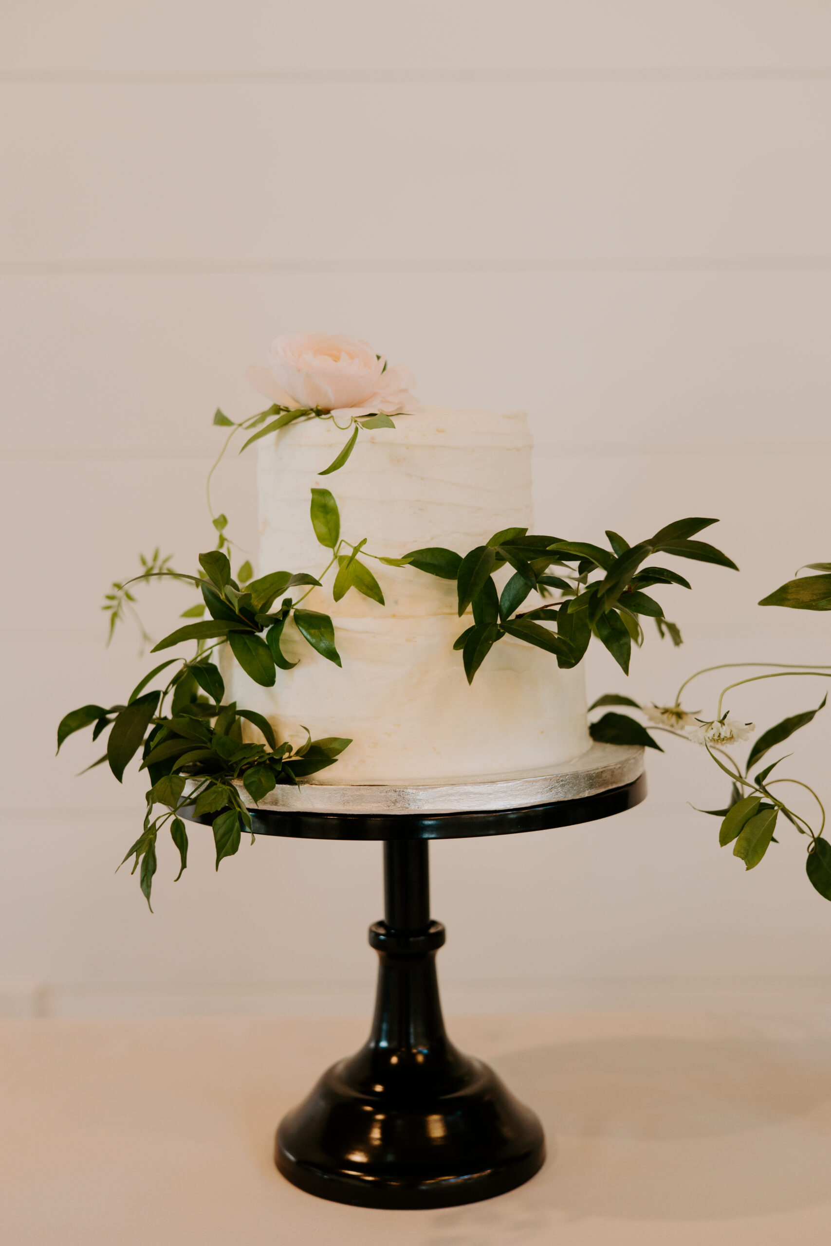 Cascading blooms on wedding cake