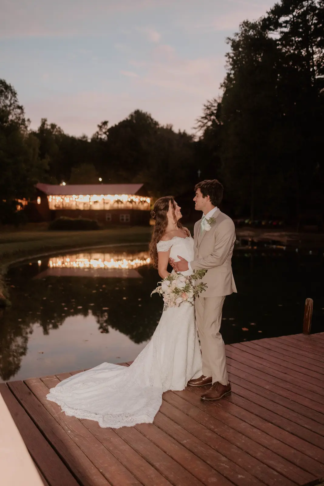 dock wedding with background lights