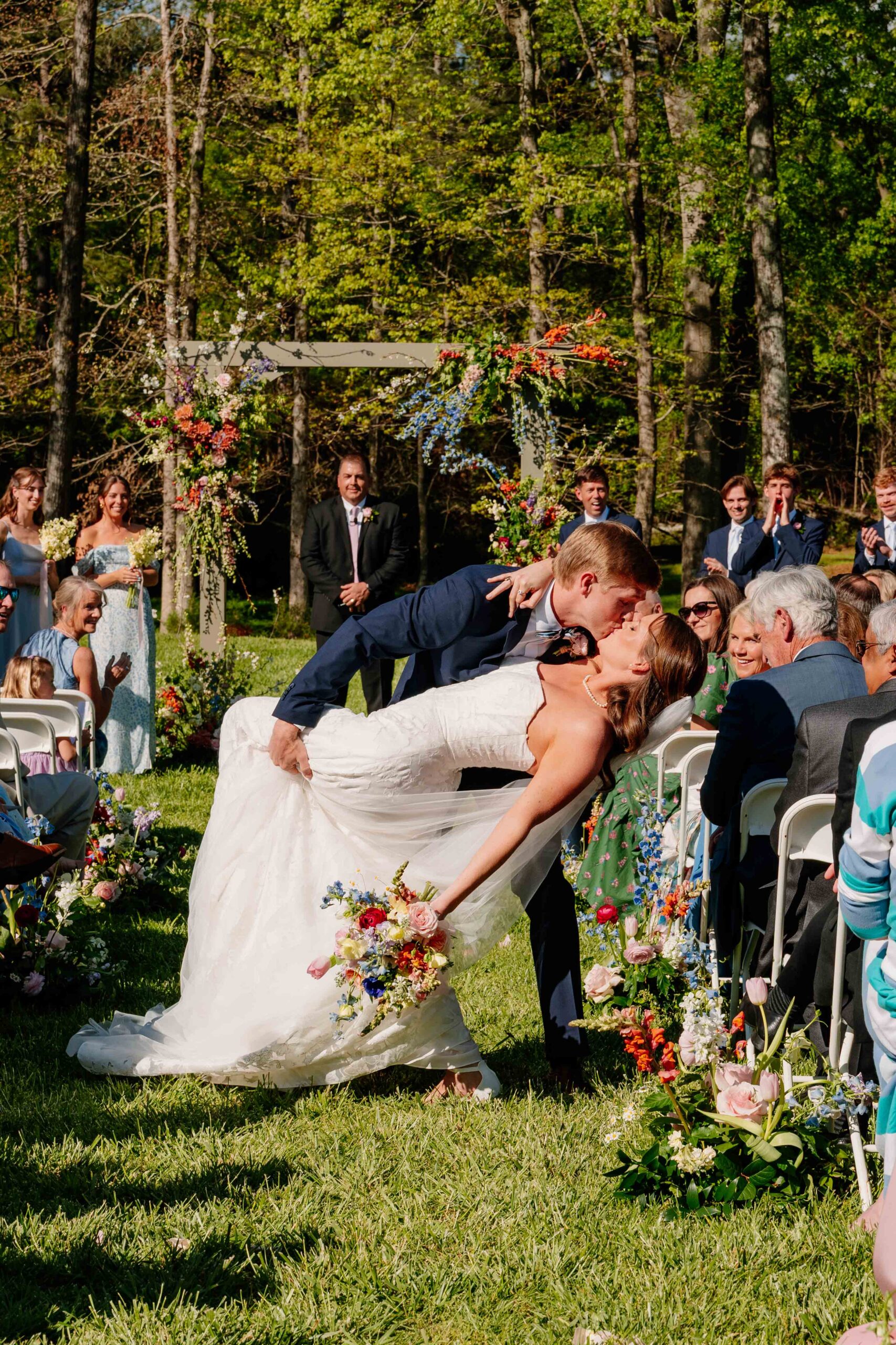 Florals wrapped around ceremony columns