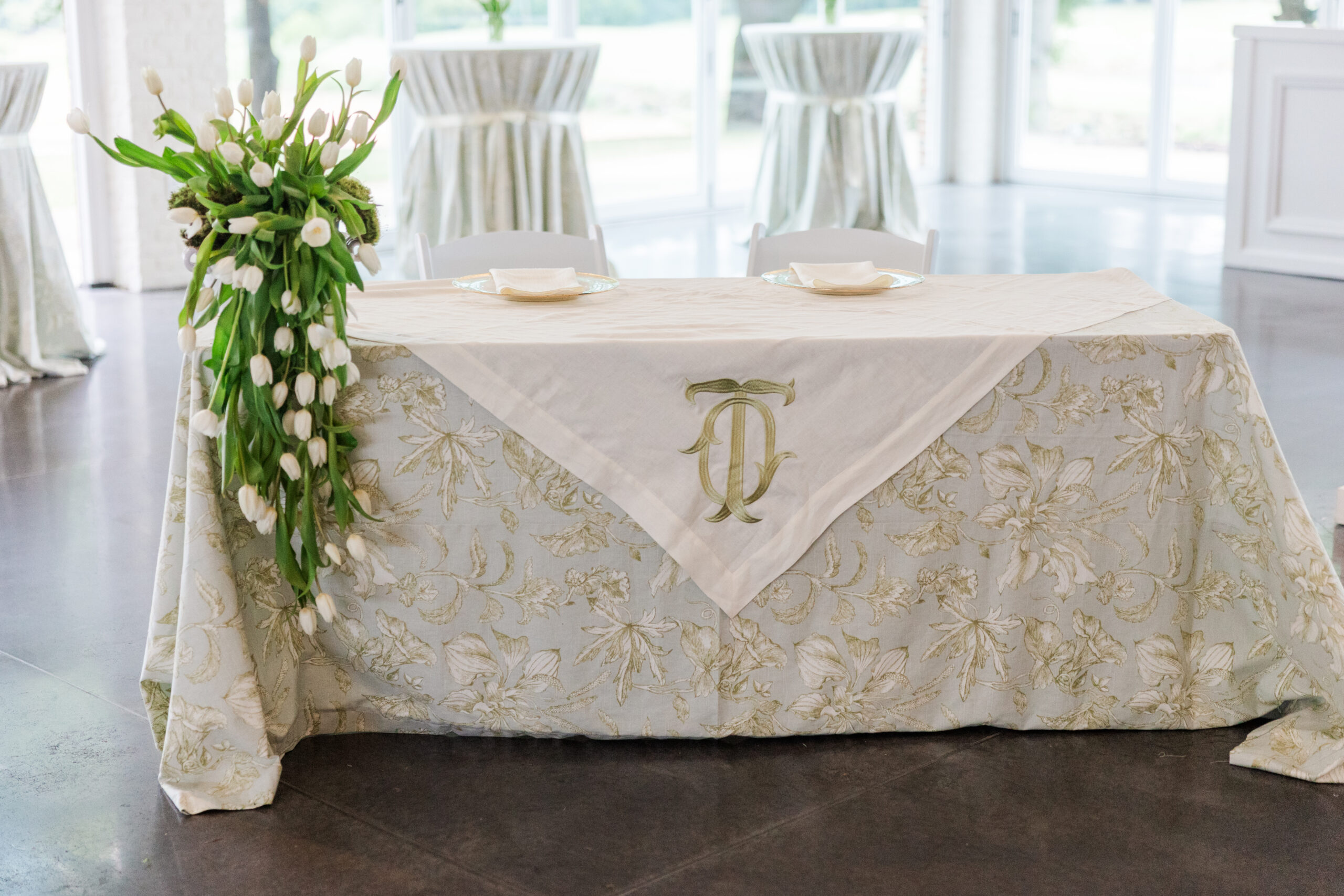 Sweetheart table with cascading tulip floral installation